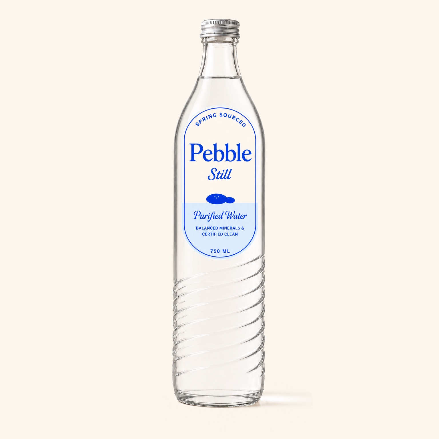 A Pebble bottle resting on grass